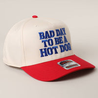 BAD DAY TO BE A HOT DOG Embroidered Trucker Hat : RYL/NATL / One Size