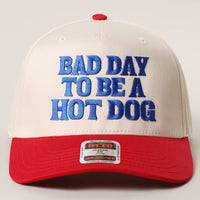 BAD DAY TO BE A HOT DOG Embroidered Trucker Hat : RYL/NATL / One Size